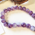 Glaspärlor 8,5-9mm Lila Swirl, 20st