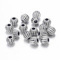 Små Bicone Metallpärlor Distanspärlor 4x4,5mm Antiksilver, 10st