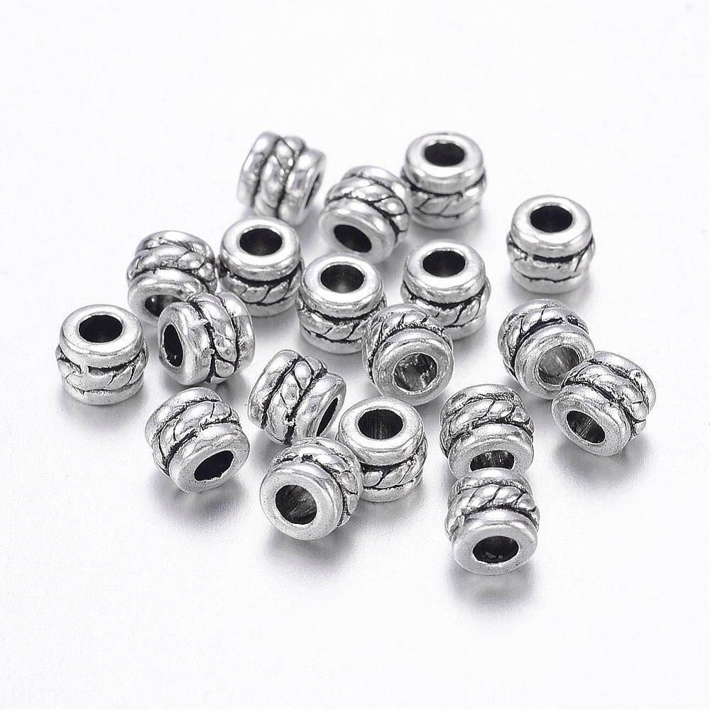 Bicone Distanspärlor 5x4mm Antiksilver Nickelfria, 10-pack