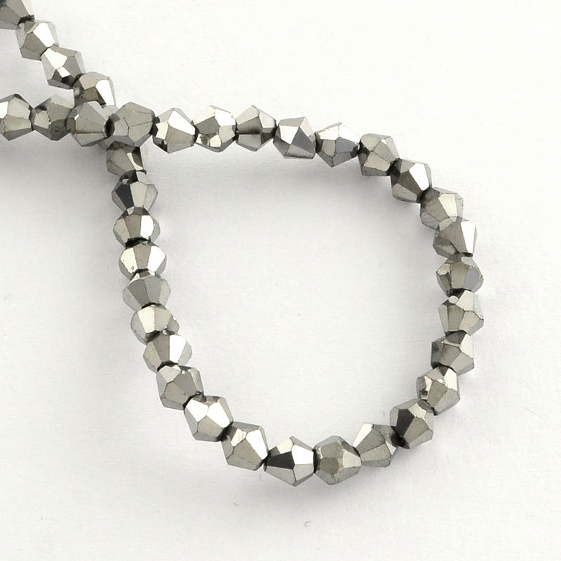 Små Fasetterade Biconformade Glaspärlor 3x3,5mm Silverpläterade, 1 sträng (ca 105st)