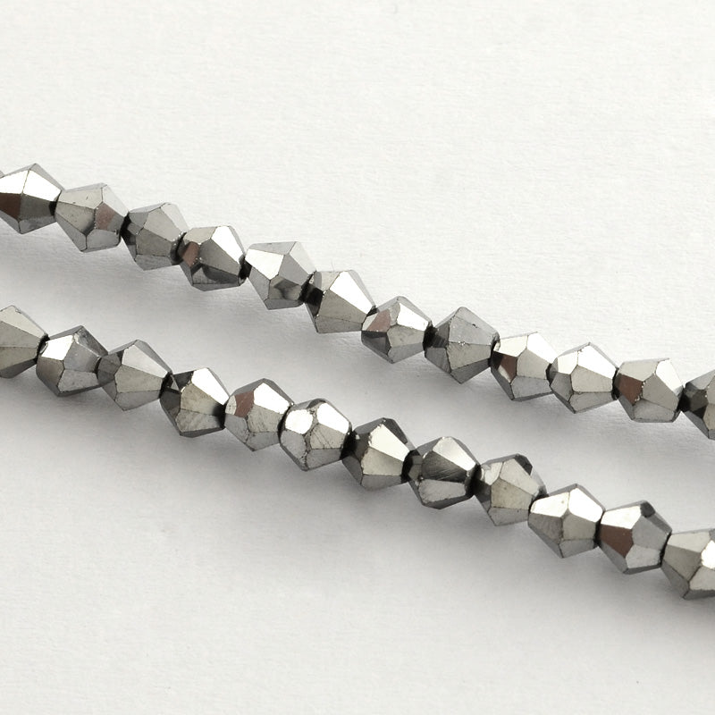 Små Fasetterade Biconformade Glaspärlor 3x3,5mm Silverpläterade, 1 sträng (ca 105st)