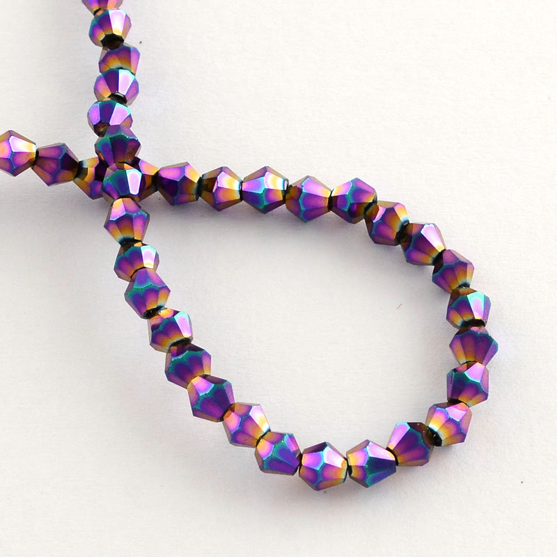 Små Fasetterade Biconformade Glaspärlor 3x3,5mm Regnbågspläterade, 1 sträng (ca 105st)