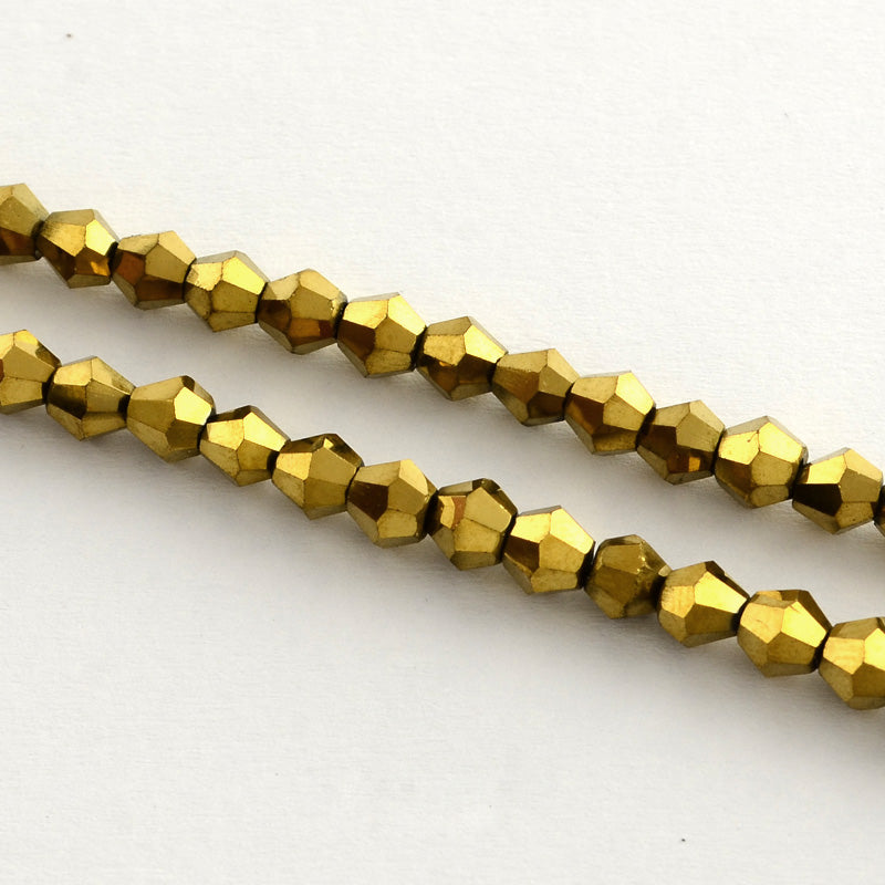 Små Fasetterade Biconformade Glaspärlor 3x3,5mm Guldpläterade, 1 sträng (ca 105st)