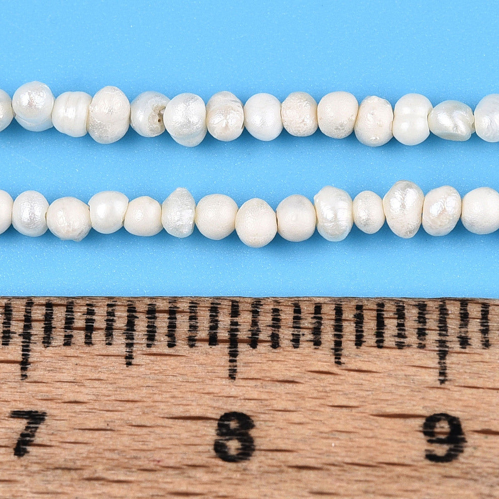 Äkta Sötvattenpärlor Pyttesmå 1,5-2,5mm x 1,5-4,5mm Beige Potatisformade, 1 sträng (ca 180st)