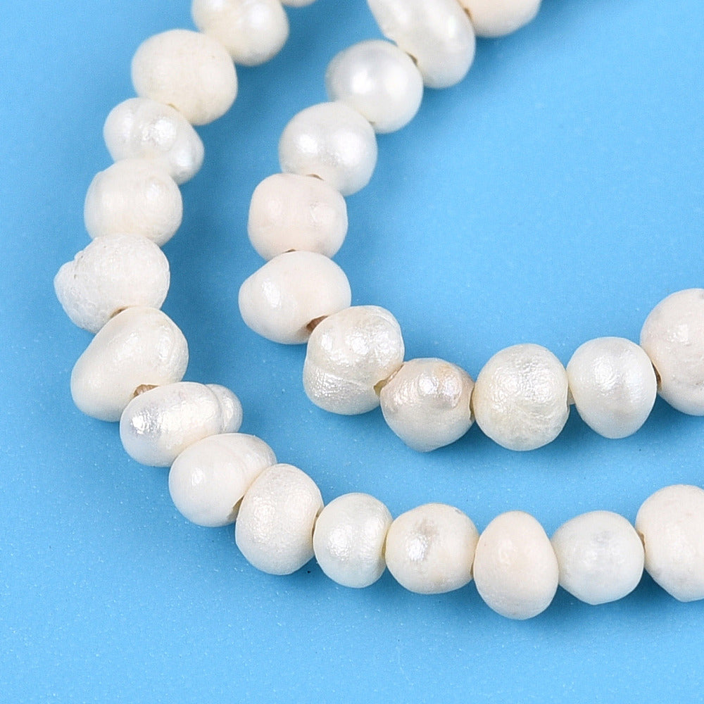 Äkta Sötvattenpärlor Pyttesmå 1,5-2,5mm x 1,5-4,5mm Beige Potatisformade, 1 sträng (ca 180st)