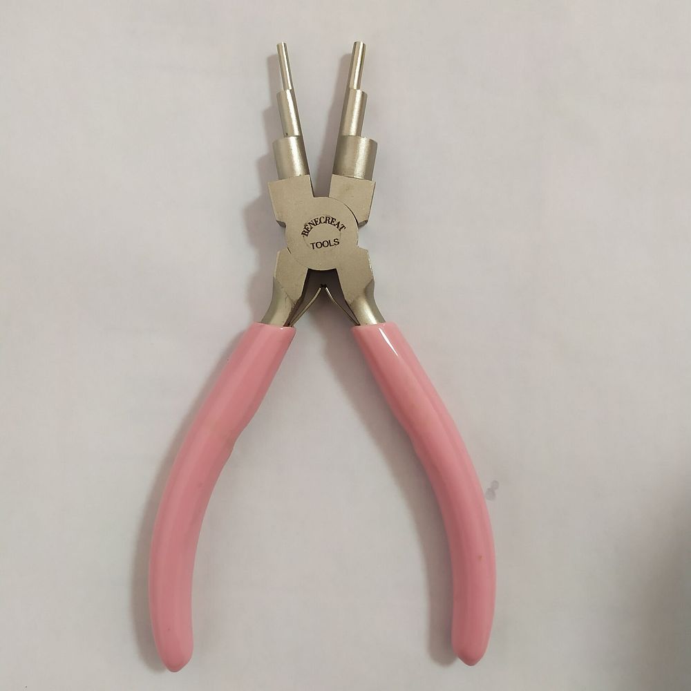 Smyckesverktyg Multiverktyg med rosa ergonomiskt handtag.