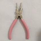 Smyckesverktyg Multiverktyg med rosa ergonomiskt handtag.