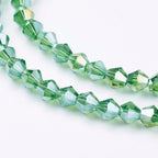 Glaspärlor facetterade biconepärlor AB Limegrön 4 mm, 1 Sträng (ca 28cm)