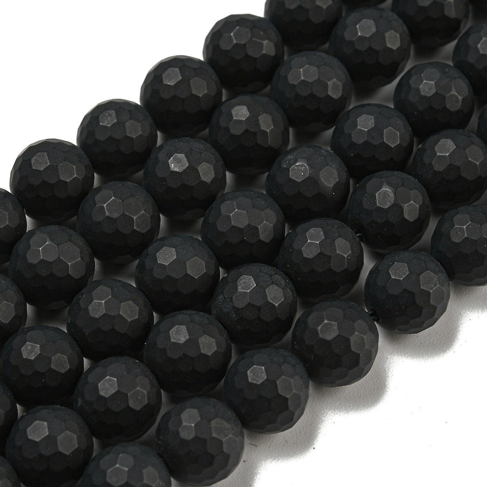Svart onyx facetterade pärlor frostade runda 8 mm, 1 sträng (ca 38cm)