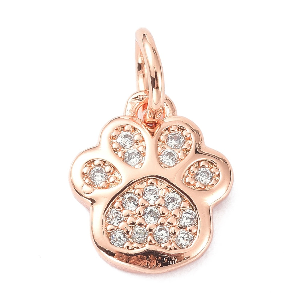 Tassavtrycksformad berlock med mikroinfattade cubic zirconia i roséguldfärg.