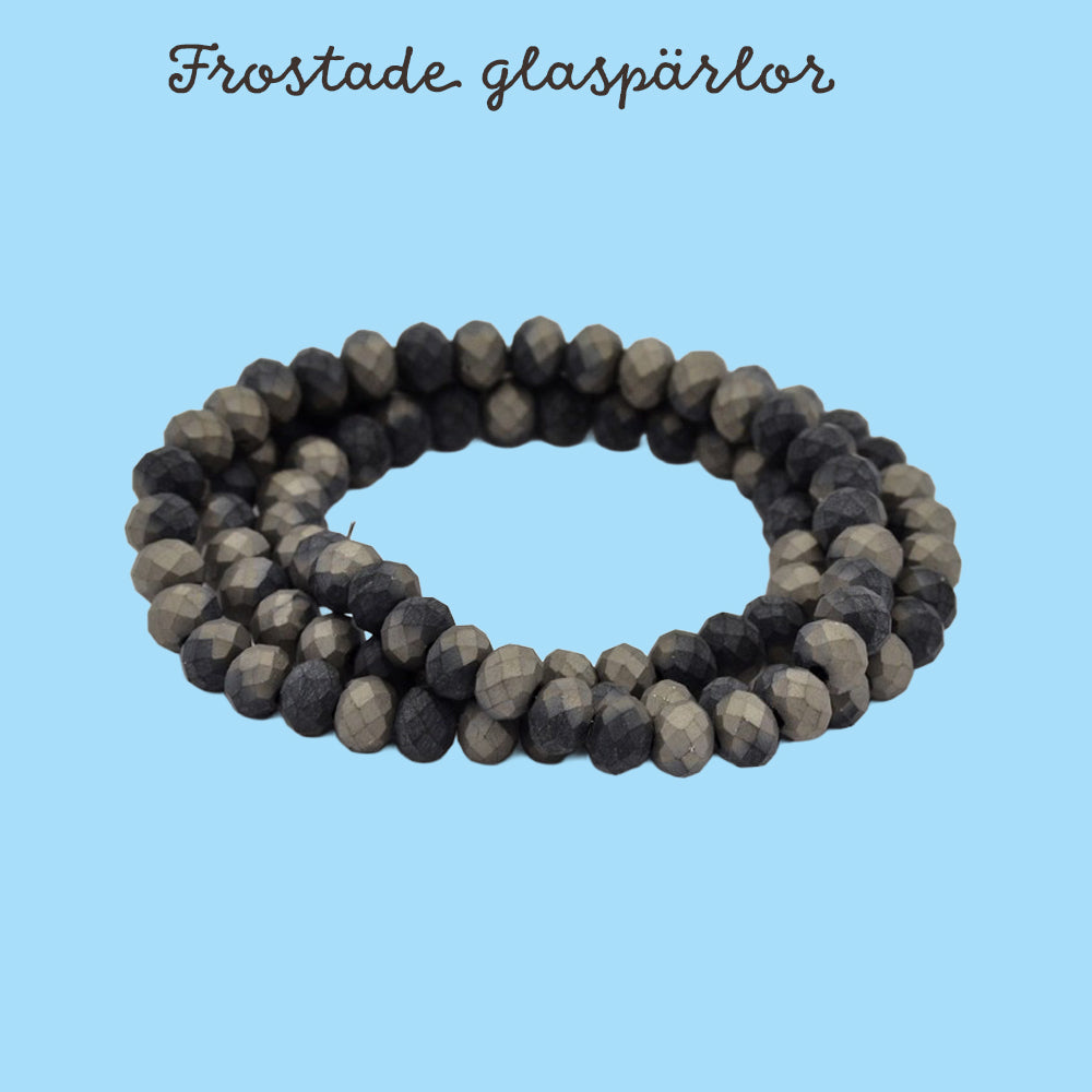 Glaspärlor rondelle matta gråsvart facetterade 6x4mm, 1 sträng (36 cm)
