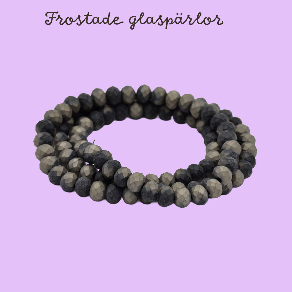 Glaspärlor rondelle matta gråsvart facetterade 6x4mm, 1 sträng (36 cm)