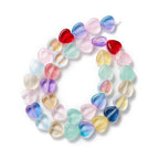 Glaspärlor hjärtformade ca 10mm transparent färgmix, 1 sträng (33cm)