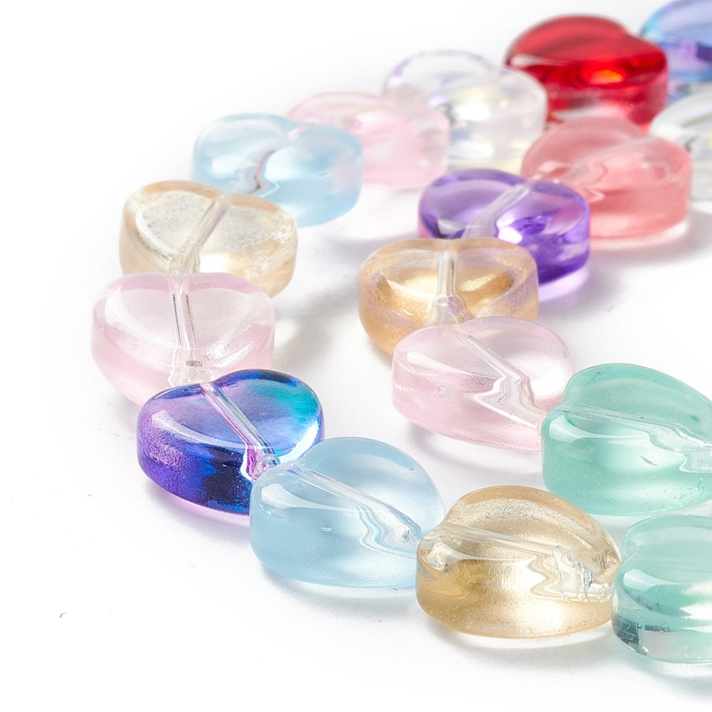 Glaspärlor hjärtformade ca 10mm transparent färgmix, 1 sträng (33cm)