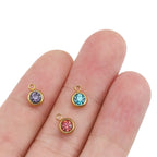 Rund berlock 6mm i rostfritt stål och klar strass gyllene, 2-pack