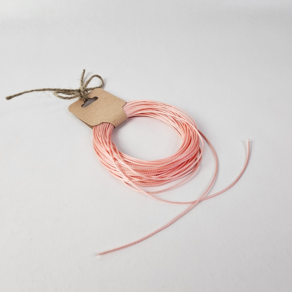 Vaxad flätad smyckestråd 0,8 mm Rosa, 8 meter