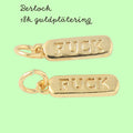 Mässingsberlock med bindring 4x14mm och text Fuck på båda sidor 18K guldpläterad, 1 st