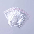Cellofanpåsar innerdiameter 8x7cm med självhäftande förslutning, 100-pack
