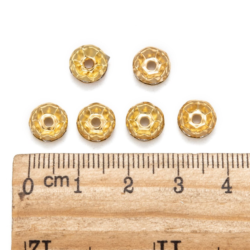 Strassrondeller Vågig kant 8mm Gyllene med Klar sten, 10-pack
