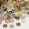 Metallpärlor 8,5mm Mix Mellanrondeller Snöflingor Daisys Glorior, 50-pack