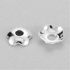 Pärlhattar 4mm i mässing Silverpläterade, 50-pack