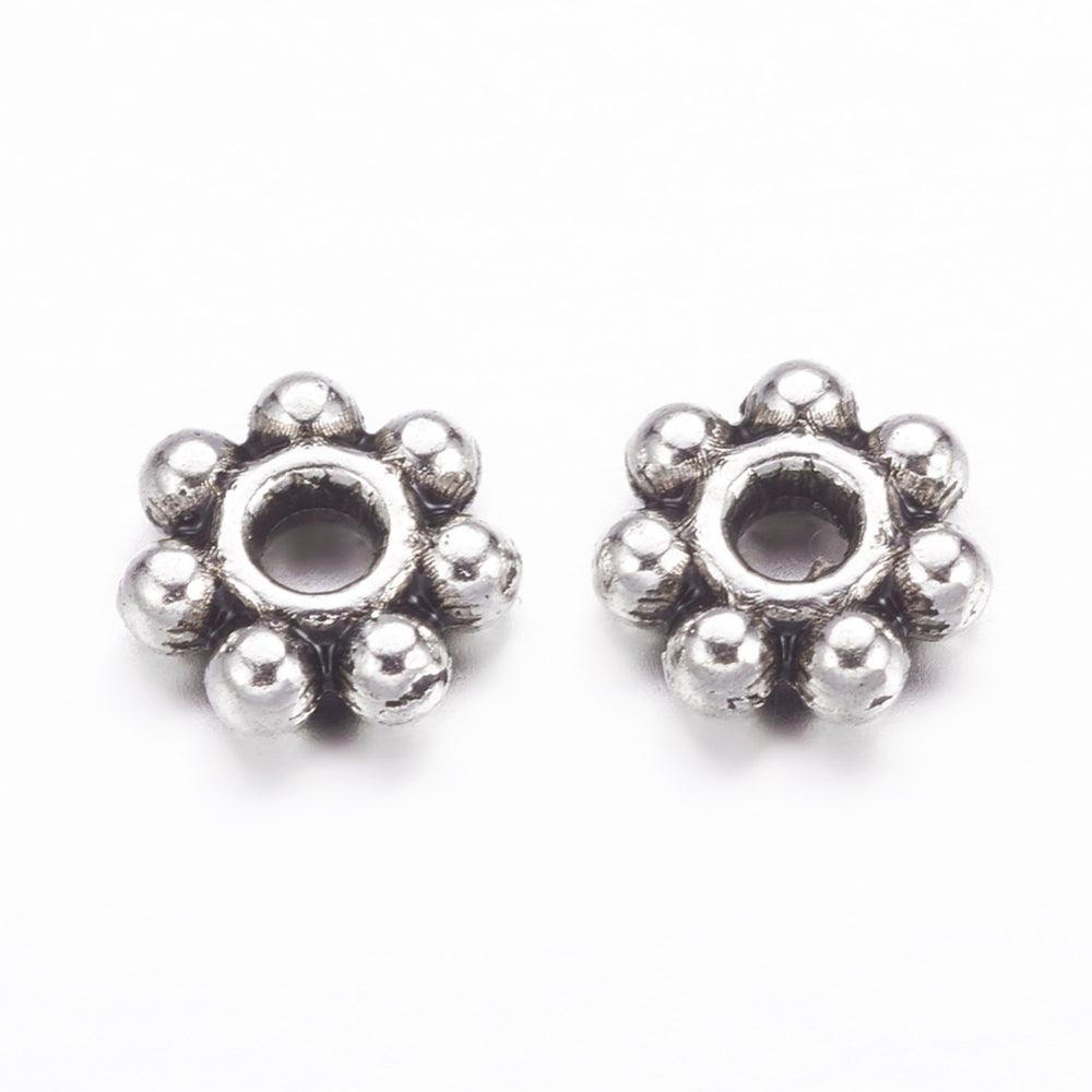 Små Metallpärlor Daisys 4mm Antiksilver, 50st