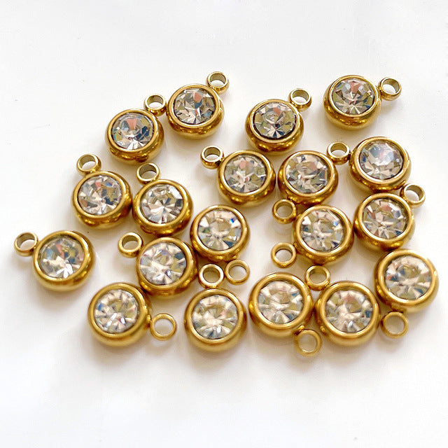 Rund berlock 6mm i rostfritt stål och klar strass gyllene, 2-pack